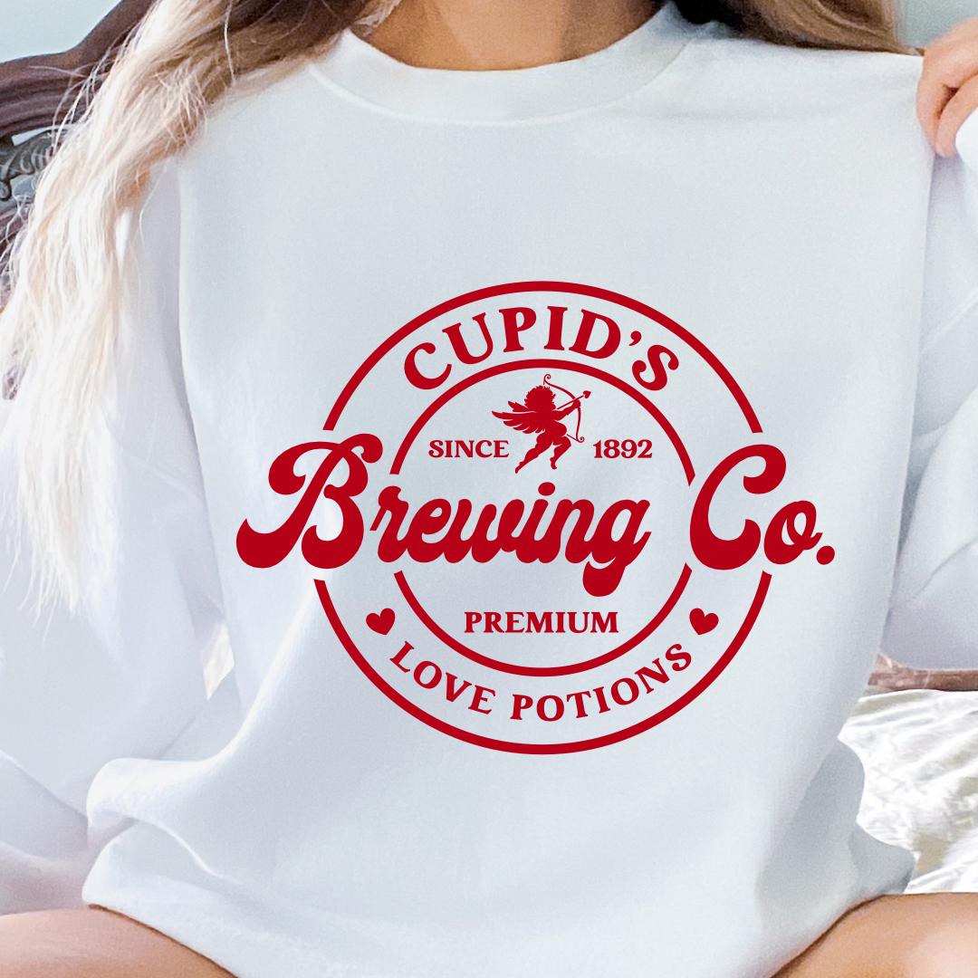 Cupid S Love Potion design printed on soft cotton tee and sweatshirt, featuring motivational graphic tee