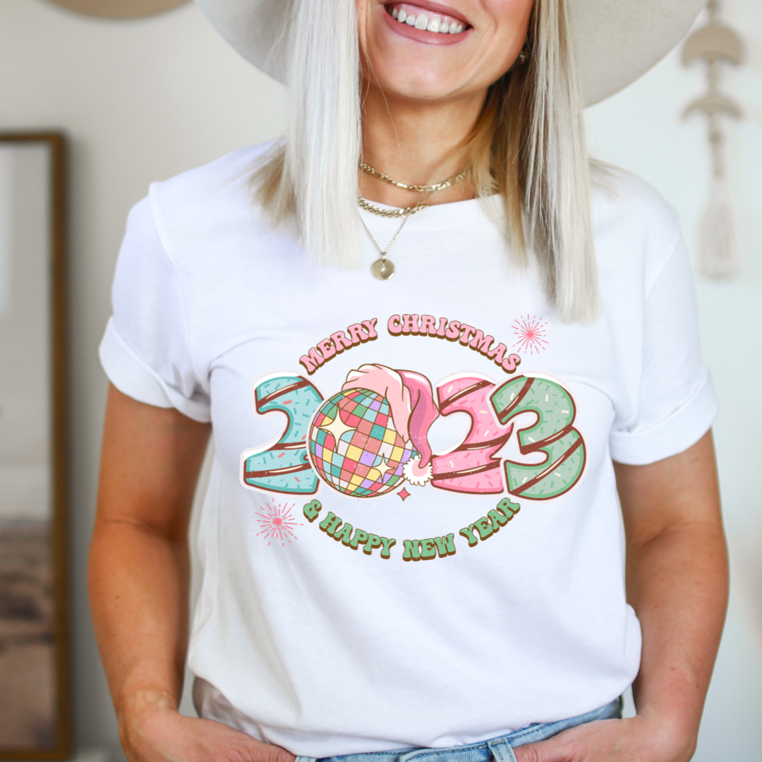 Happy 2023 design printed on soft cotton tee and sweatshirt, featuring motivational graphic tee