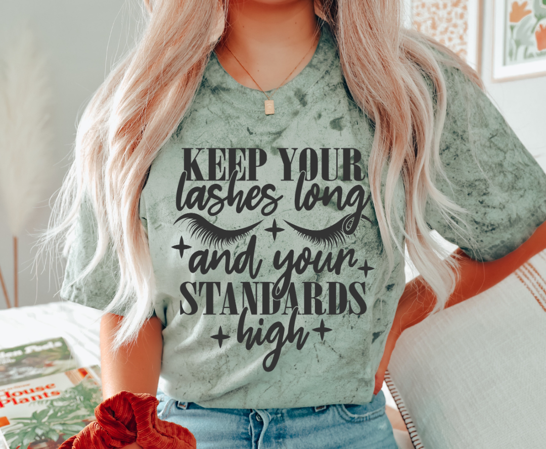 Keep Your Lashes Long design printed on soft cotton tee and sweatshirt, featuring motivational graphic tee