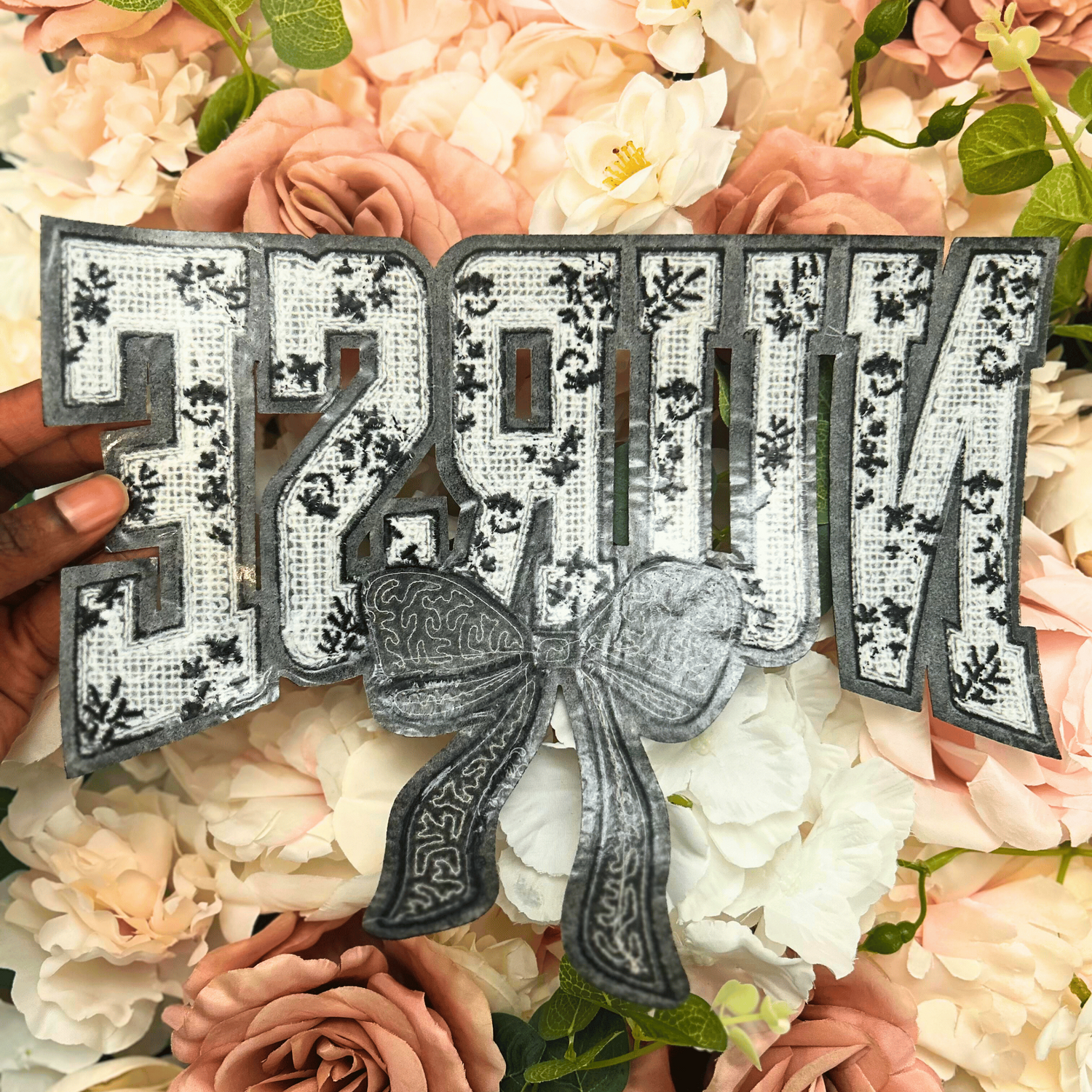 Decorative letters spelling &