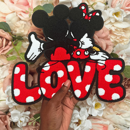 Decorative patch with Mickey and Minnie Mouse heads and &