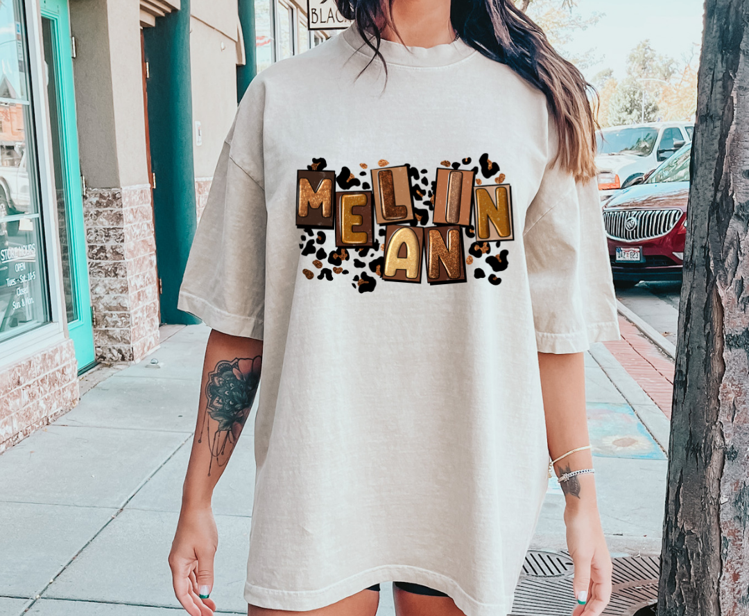Melanin design printed on soft cotton tee and sweatshirt, featuring motivational graphic tee