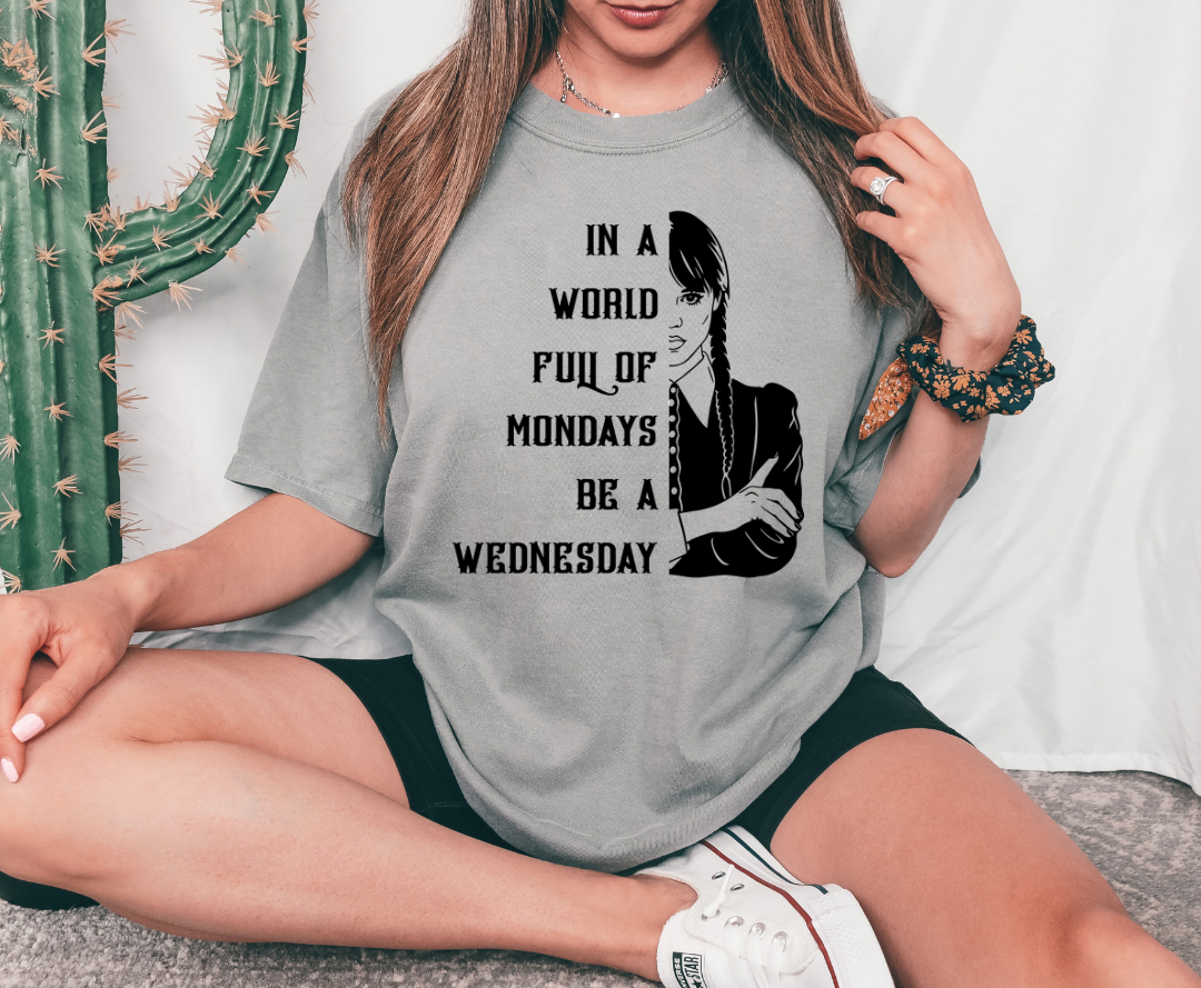 In A World Full Of Mondays design printed on soft cotton tee and sweatshirt, featuring motivational graphic tee