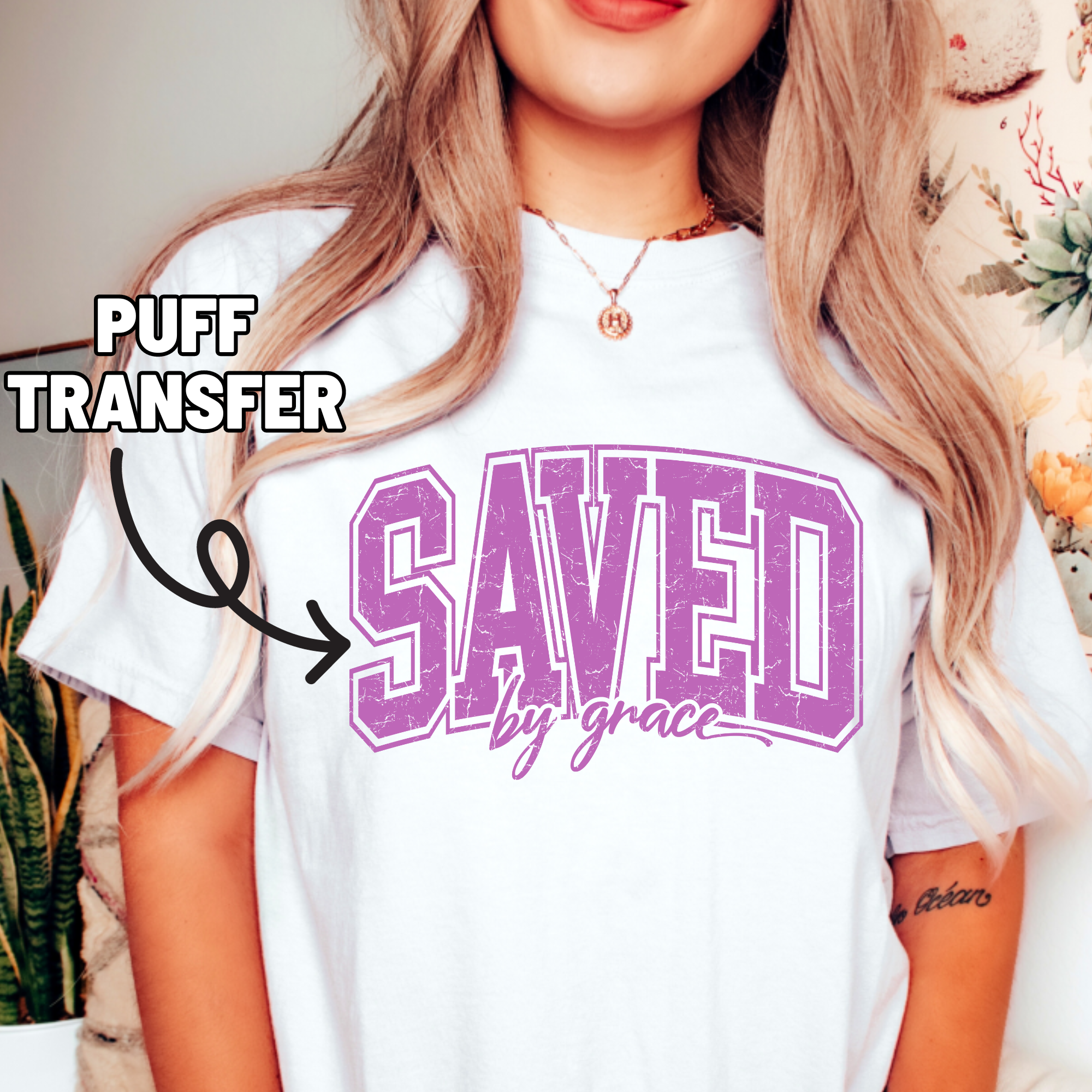 Saved By Grace Puff design printed on soft cotton tee and sweatshirt, featuring motivational graphic tee