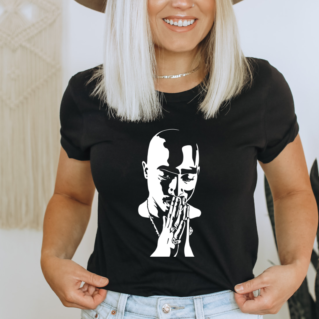 Pac design printed on soft cotton tee and sweatshirt, featuring motivational graphic tee