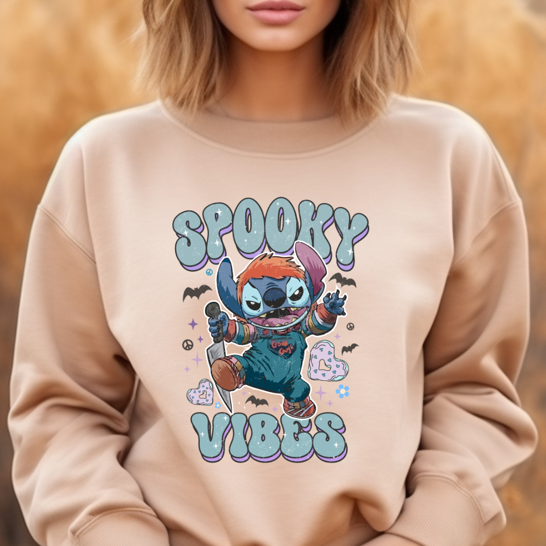 Spooky Vibes design printed on soft cotton tee and sweatshirt, featuring motivational graphic tee