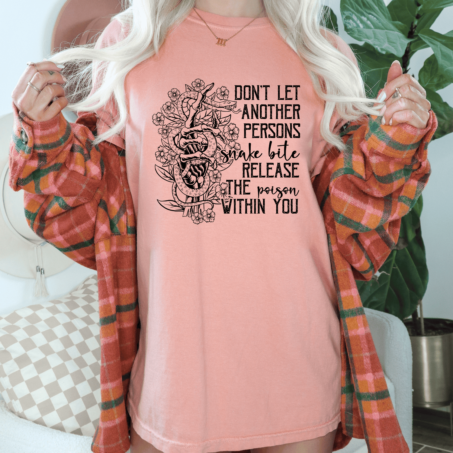 Snake Bite design printed on soft cotton tee and sweatshirt, featuring motivational graphic tee