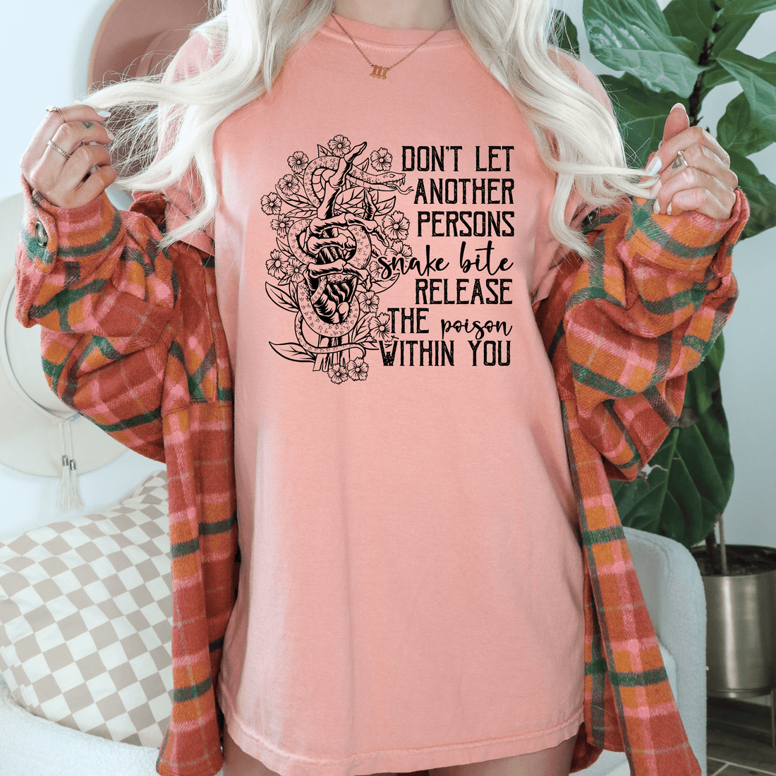 Snake Bite design printed on soft cotton tee and sweatshirt, featuring motivational graphic tee