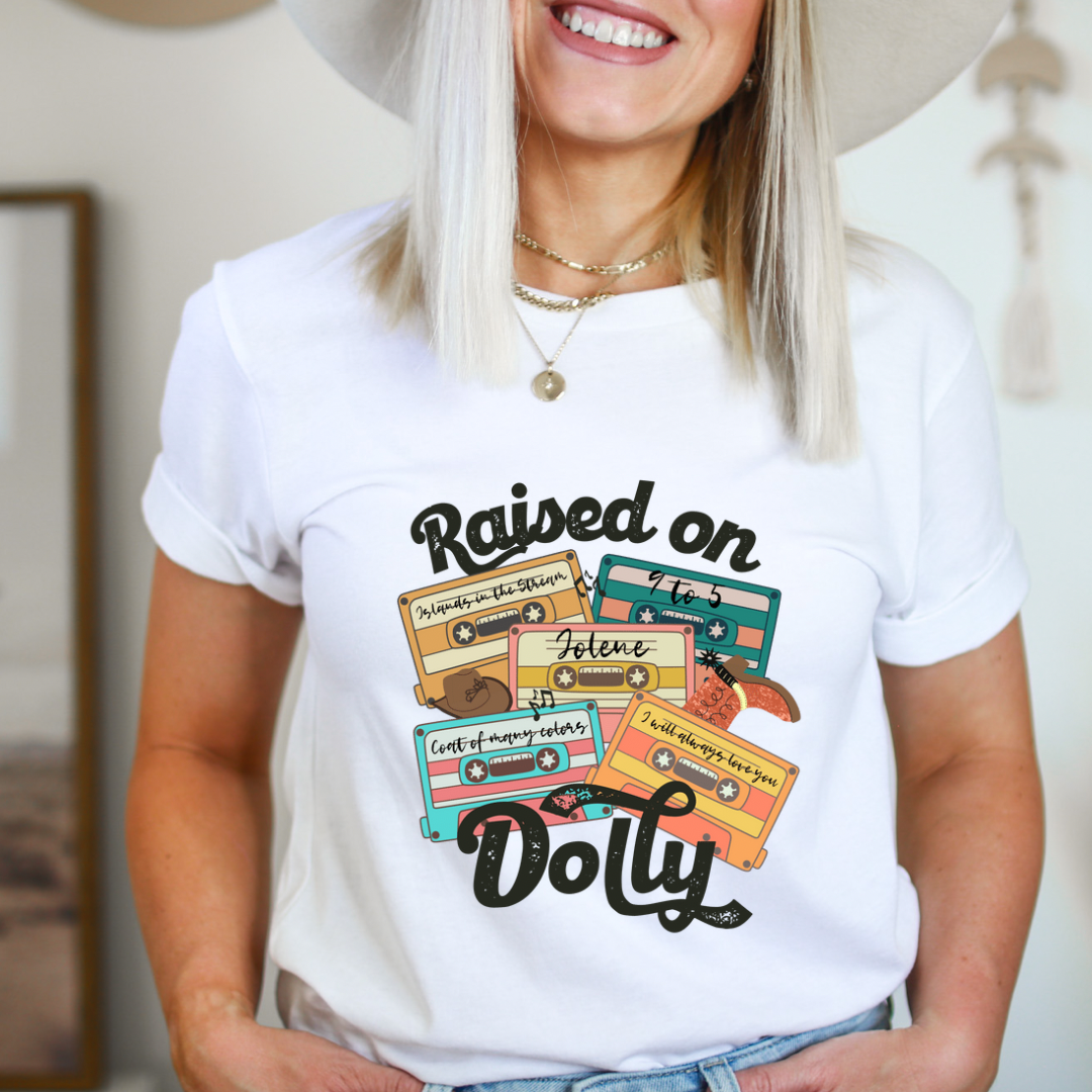 Raised On Dolly design printed on soft cotton tee and sweatshirt, featuring motivational graphic tee